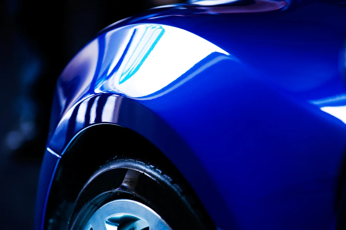 Close up of a repaired blue vehicle